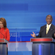 Michele Bachmann and Herman Cain at a GOP debate (Getty)
